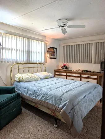 a room with window and a flat screen tv