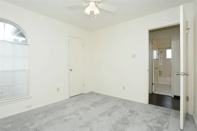 an empty room with a bathroom