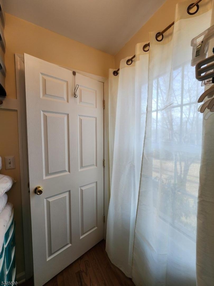342 Diamond Spring Road Denville, NJ 07834 - Photo 3 of 9 a bathroom with a glass door shower