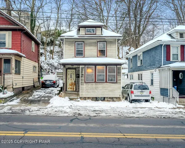 a car parked on the side of a street