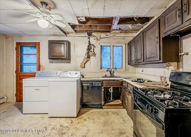 a kitchen with a stove and a sink