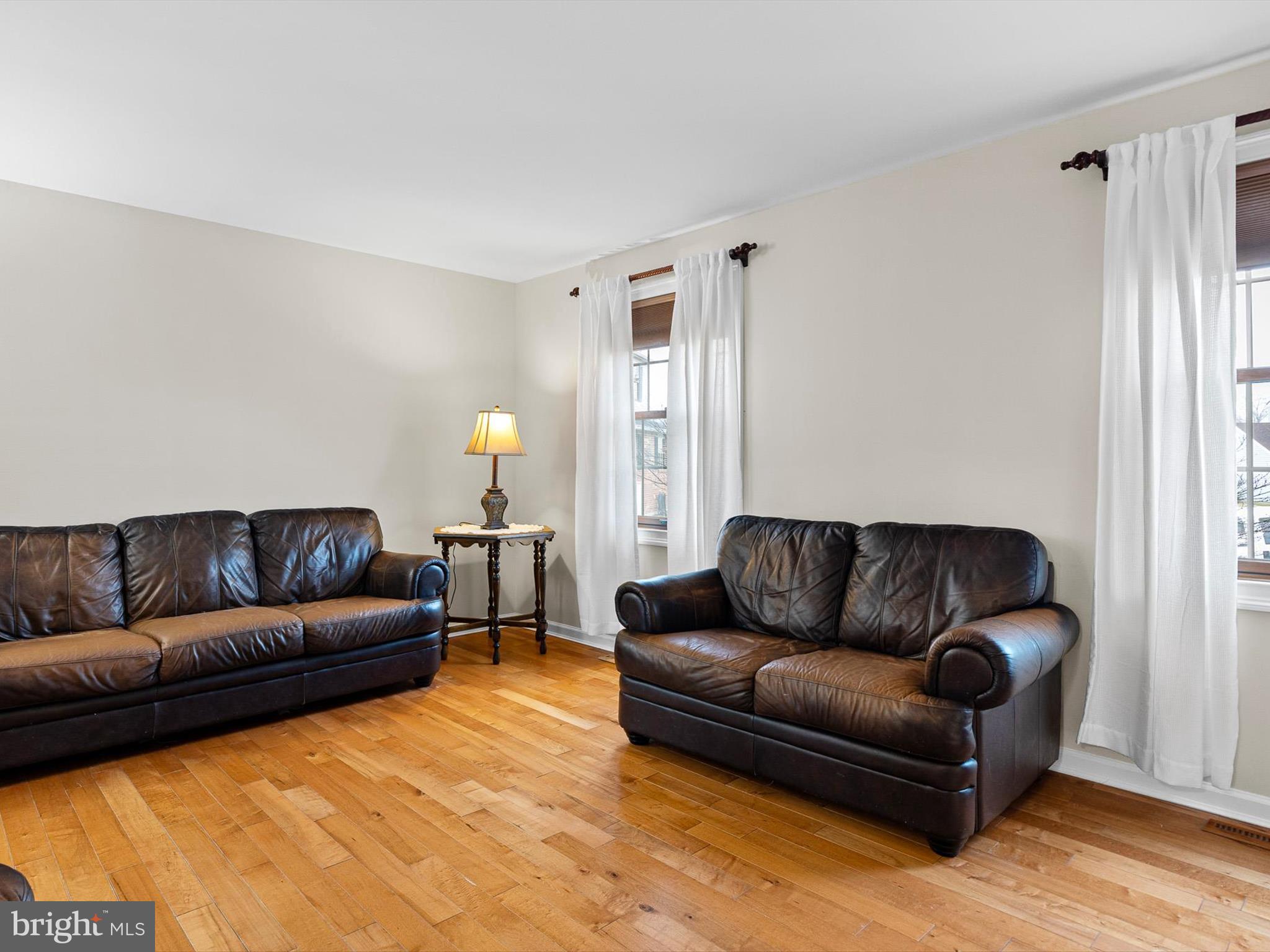 46 Westbridge Road Bear, DE 19701 - Photo 3 of 25 a living room with a couch and a couch