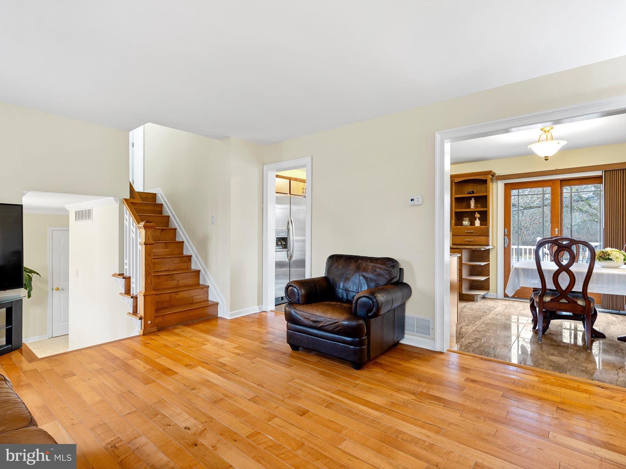 46 Westbridge Road Bear, DE 19701 - Photo 5 of 25 a living room with furniture and a wooden floor