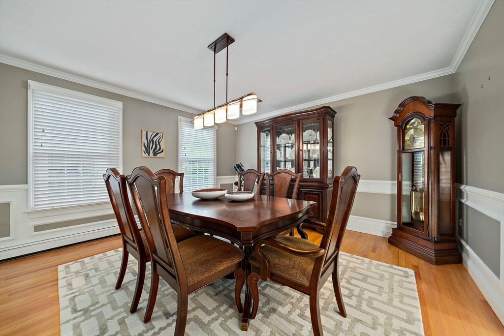 100 York Brook Road Canton, MA 02021 - Photo 16 of 42 a view of a dining room with furniture window and wooden floor