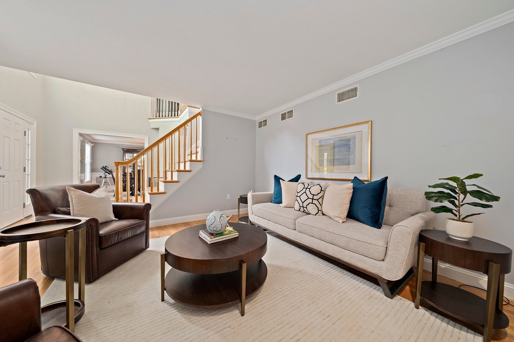 100 York Brook Road Canton, MA 02021 - Photo 18 of 42 a living room with furniture and a wooden floor