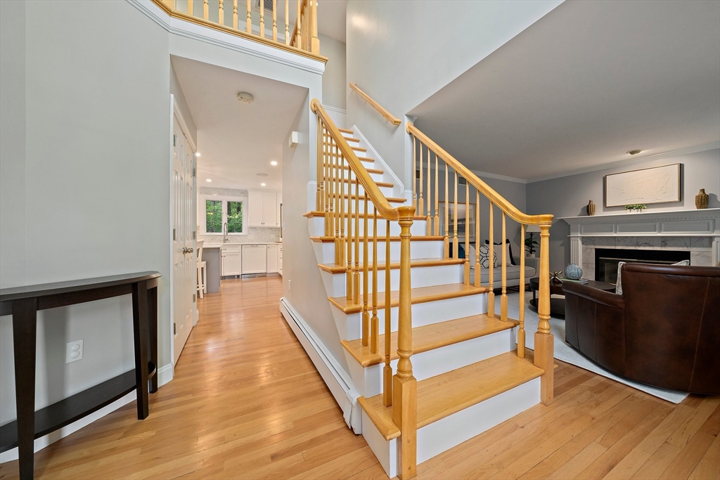 100 York Brook Road Canton, MA 02021 - Photo 21 of 42 a view of entryway and hall with wooden floor