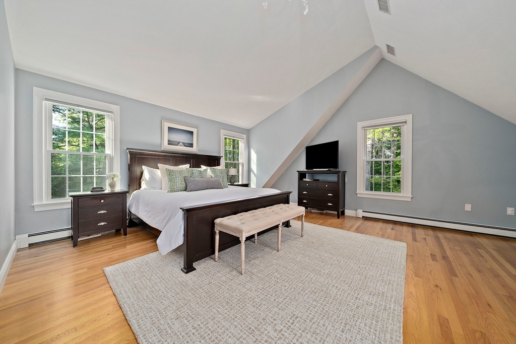 100 York Brook Road Canton, MA 02021 - Photo 23 of 42 a bedroom with furniture and flat screen tv