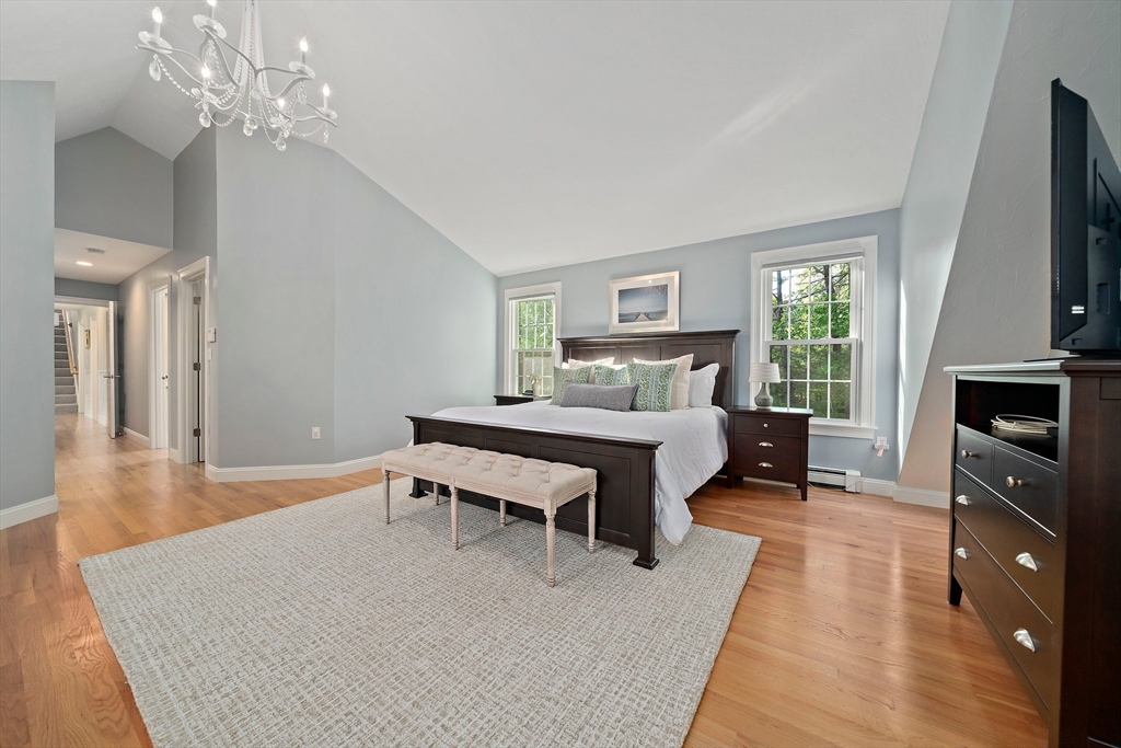 100 York Brook Road Canton, MA 02021 - Photo 26 of 42 a bedroom with a bed and a flat screen tv