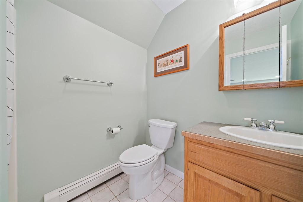 100 York Brook Road Canton, MA 02021 - Photo 34 of 42 a bathroom with a toilet a sink and mirror