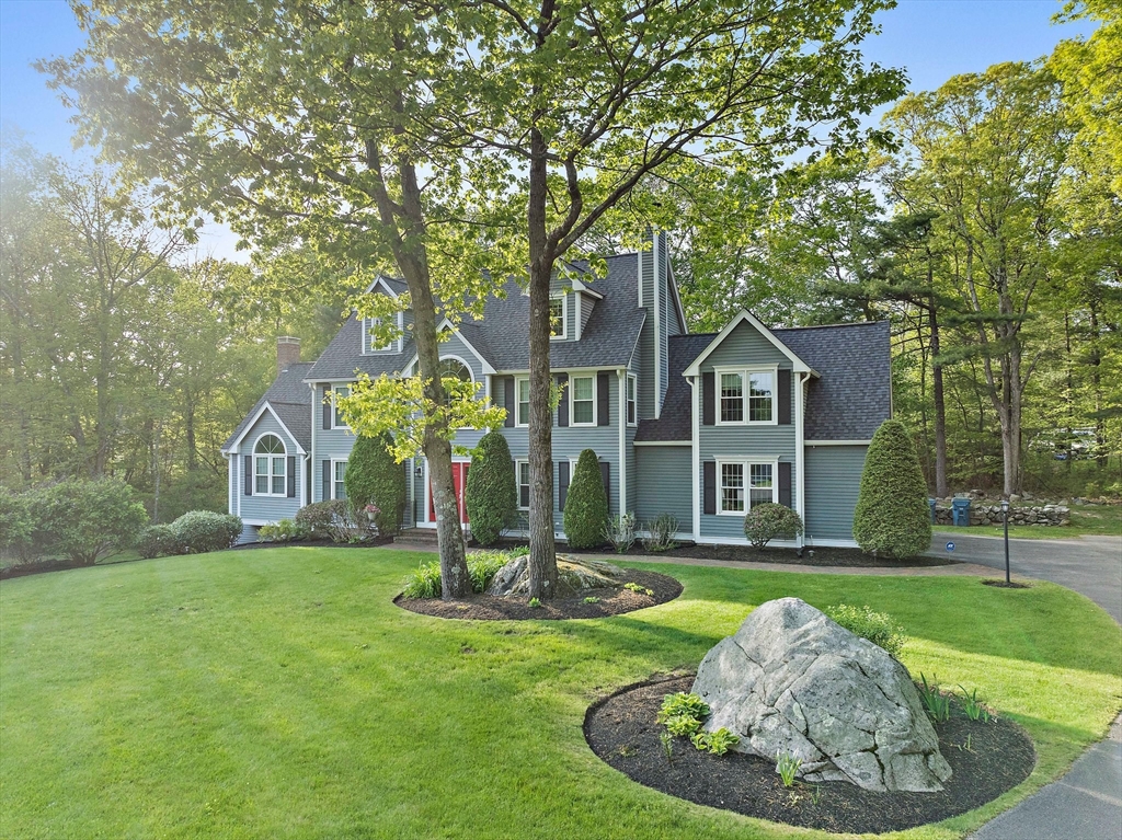 100 York Brook Road Canton, MA 02021 - Photo 4 of 42 a front view of a house with a yard