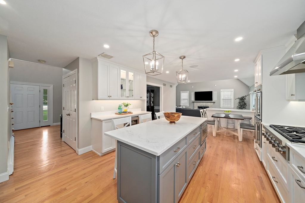 100 York Brook Road Canton, MA 02021 - Photo 7 of 42 a kitchen with a stove sink and a refrigerator