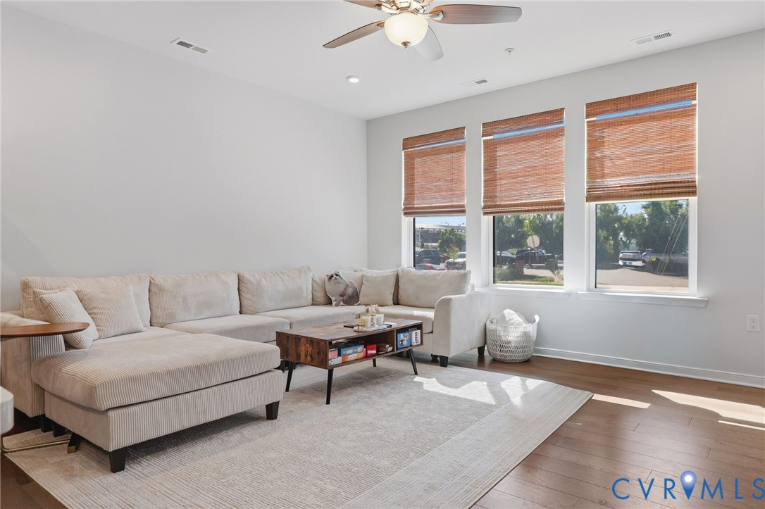 1900 Roseneath Road, Unit 4B Richmond, VA 23230 - Photo 3 of 44 a living room with furniture and a window