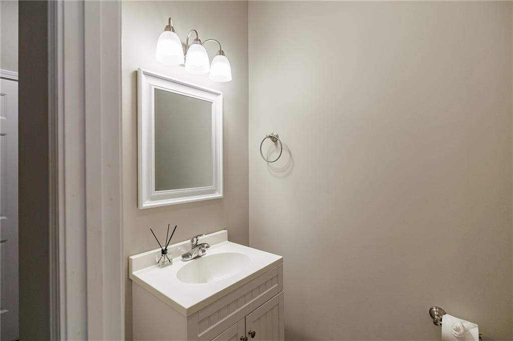 103 Three Rivers Court Hull, GA 30646 - Photo 16 of 40 a bathroom with a sink and a mirror