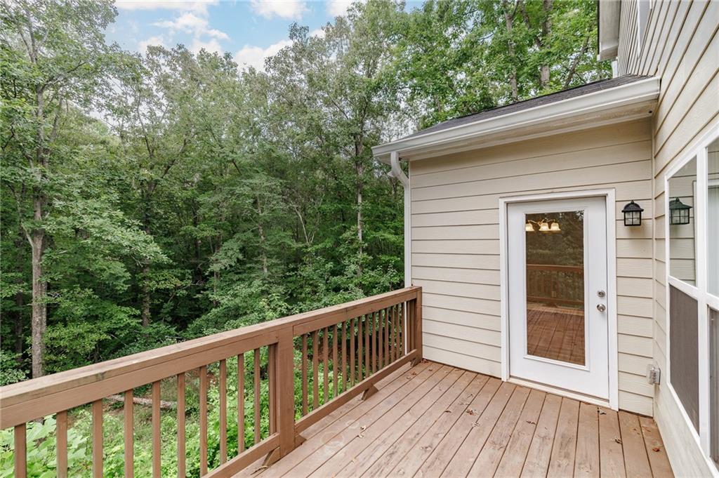 103 Three Rivers Court Hull, GA 30646 - Photo 19 of 40 a view of a wooden deck