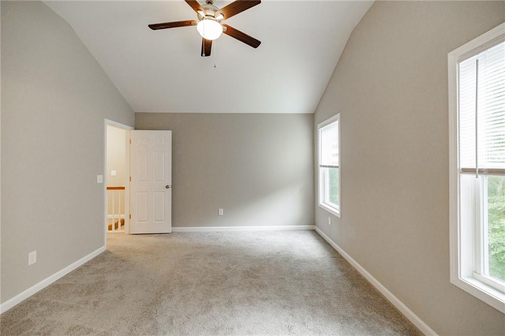 103 Three Rivers Court Hull, GA 30646 - Photo 22 of 40 a view of an empty room with a window