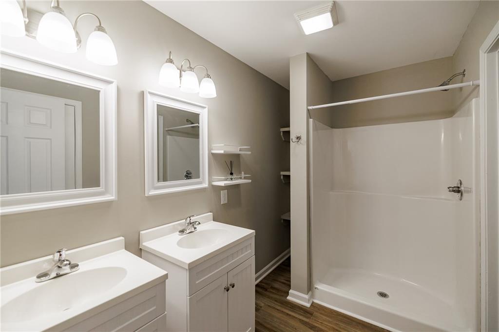 103 Three Rivers Court Hull, GA 30646 - Photo 23 of 40 a bathroom with a sink and a mirror