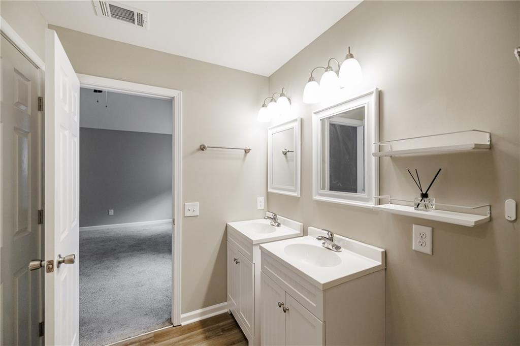 103 Three Rivers Court Hull, GA 30646 - Photo 25 of 40 a bathroom with a sink toilet and shower