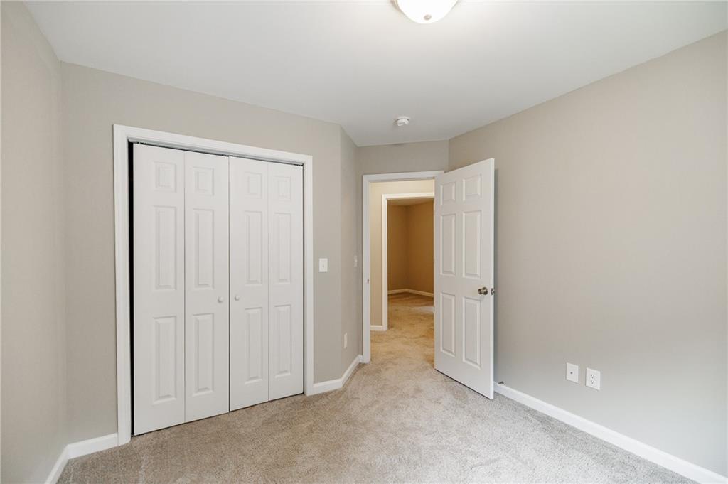 103 Three Rivers Court Hull, GA 30646 - Photo 30 of 40 an empty room with closet area