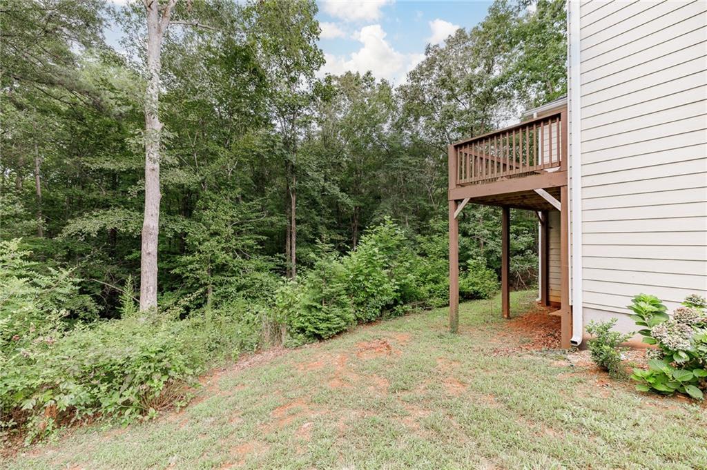 103 Three Rivers Court Hull, GA 30646 - Photo 40 of 40 a view of a house with a backyard