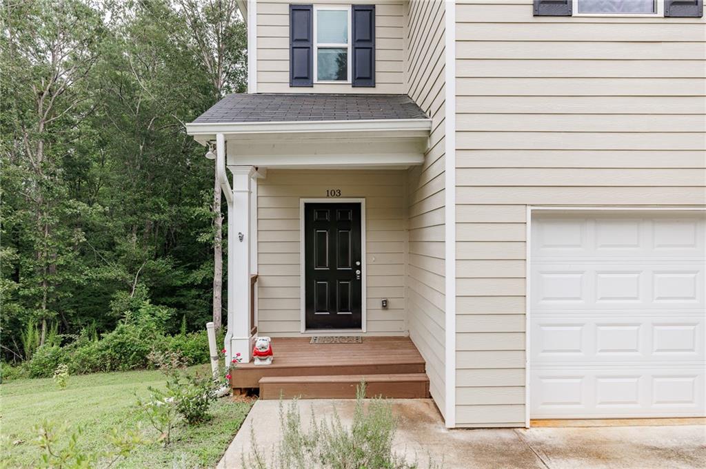 103 Three Rivers Court Hull, GA 30646 - Photo 4 of 40 a front view of a house with a yard