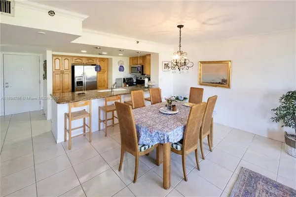 a bedroom with a bed and a mirror