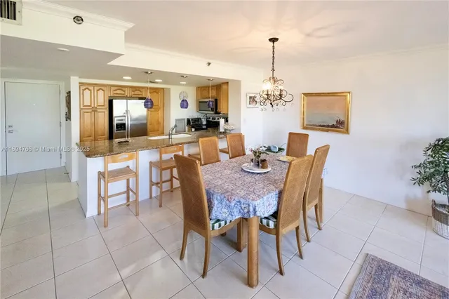 a bedroom with a bed and a mirror