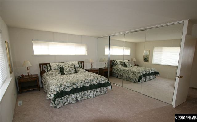 1701 Berkeley Drive Reno, NV 89509 - Photo 4 of 9 a bedroom with bed and a window