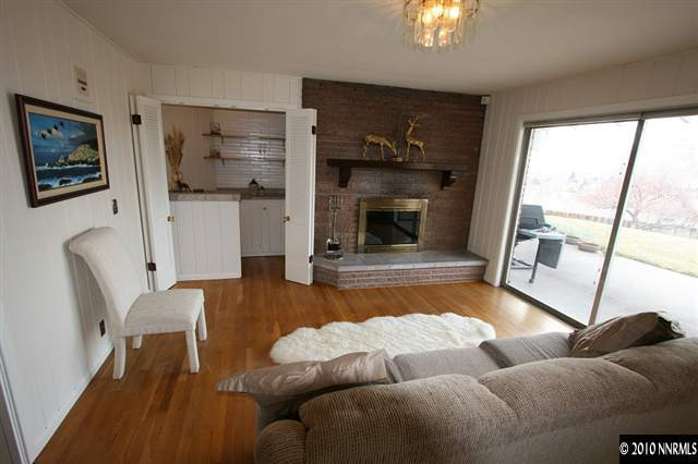 1701 Berkeley Drive Reno, NV 89509 - Photo 5 of 9 a living room with furniture and a fireplace