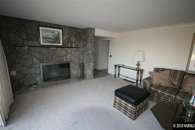 1701 Berkeley Drive Reno, NV 89509 - Photo 6 of 9 a living room with furniture and a fireplace