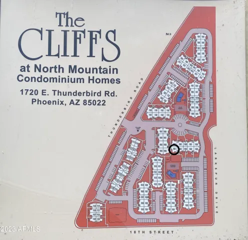 a view of swimming pool with outdoor seating and potted plants