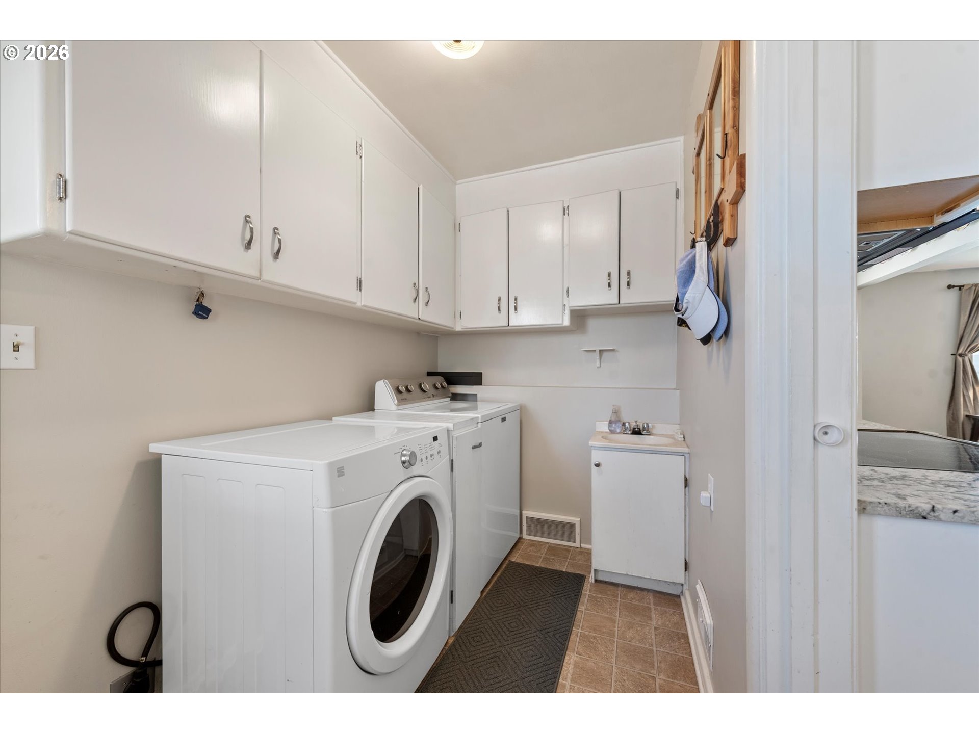 2975 North 3rd Street Baker City, OR 97814 - Photo 17 of 48 a utility room with closet dryer and washer