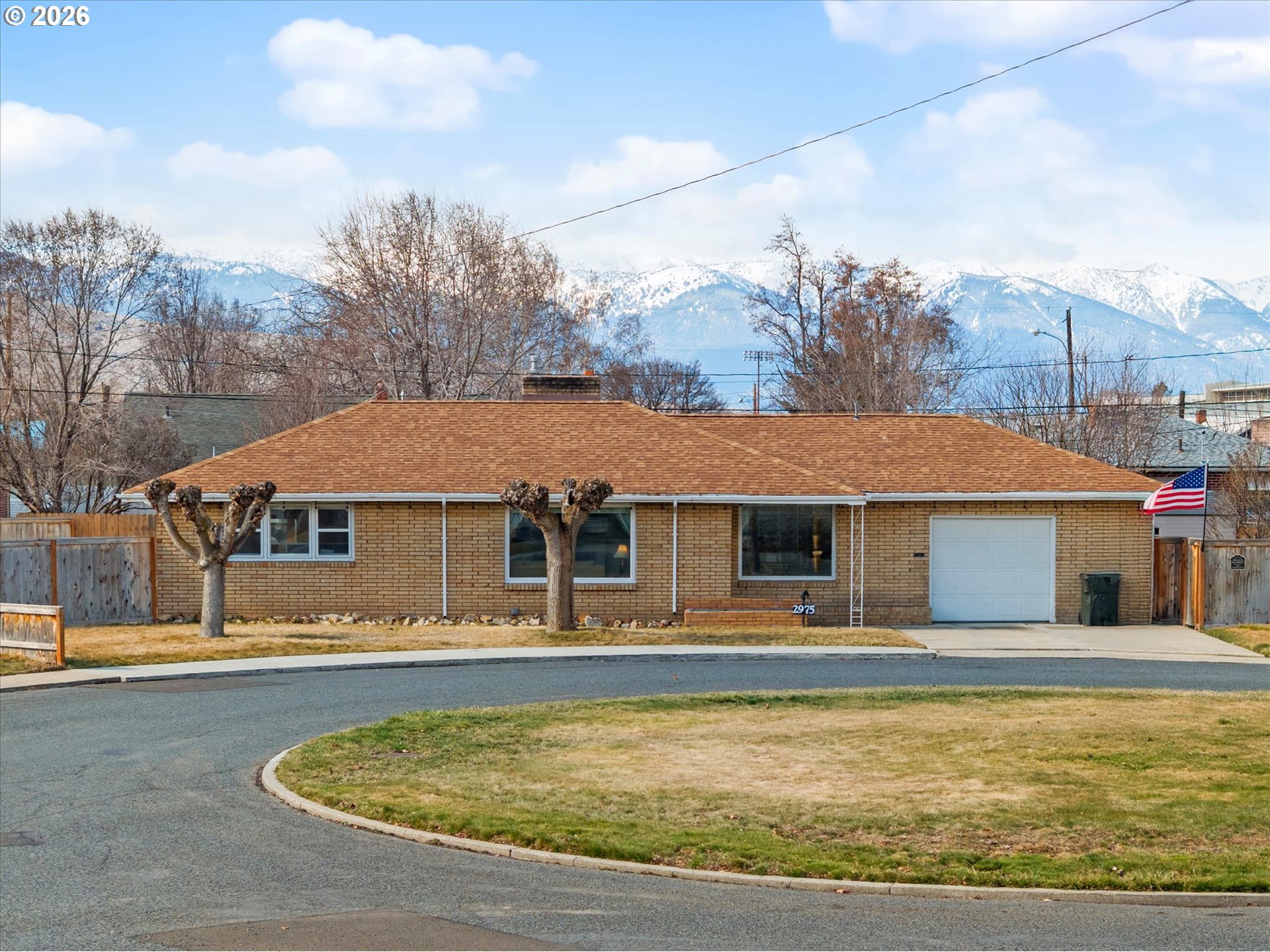 2975 North 3rd Street Baker City, OR 97814 - Photo 2 of 48 a front view of a house with a yard
