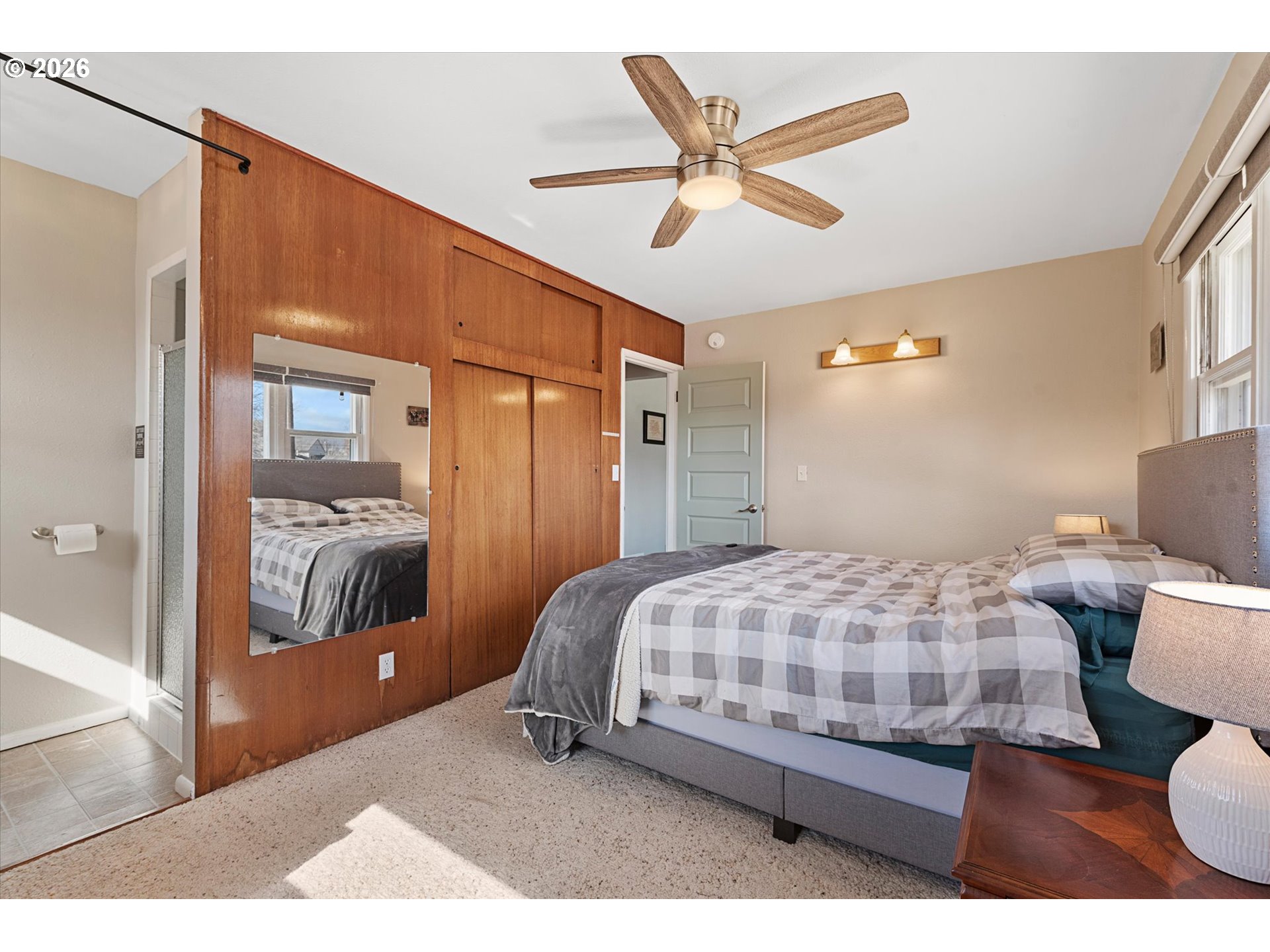 2975 North 3rd Street Baker City, OR 97814 - Photo 30 of 48 a bedroom with a bed and a chandelier