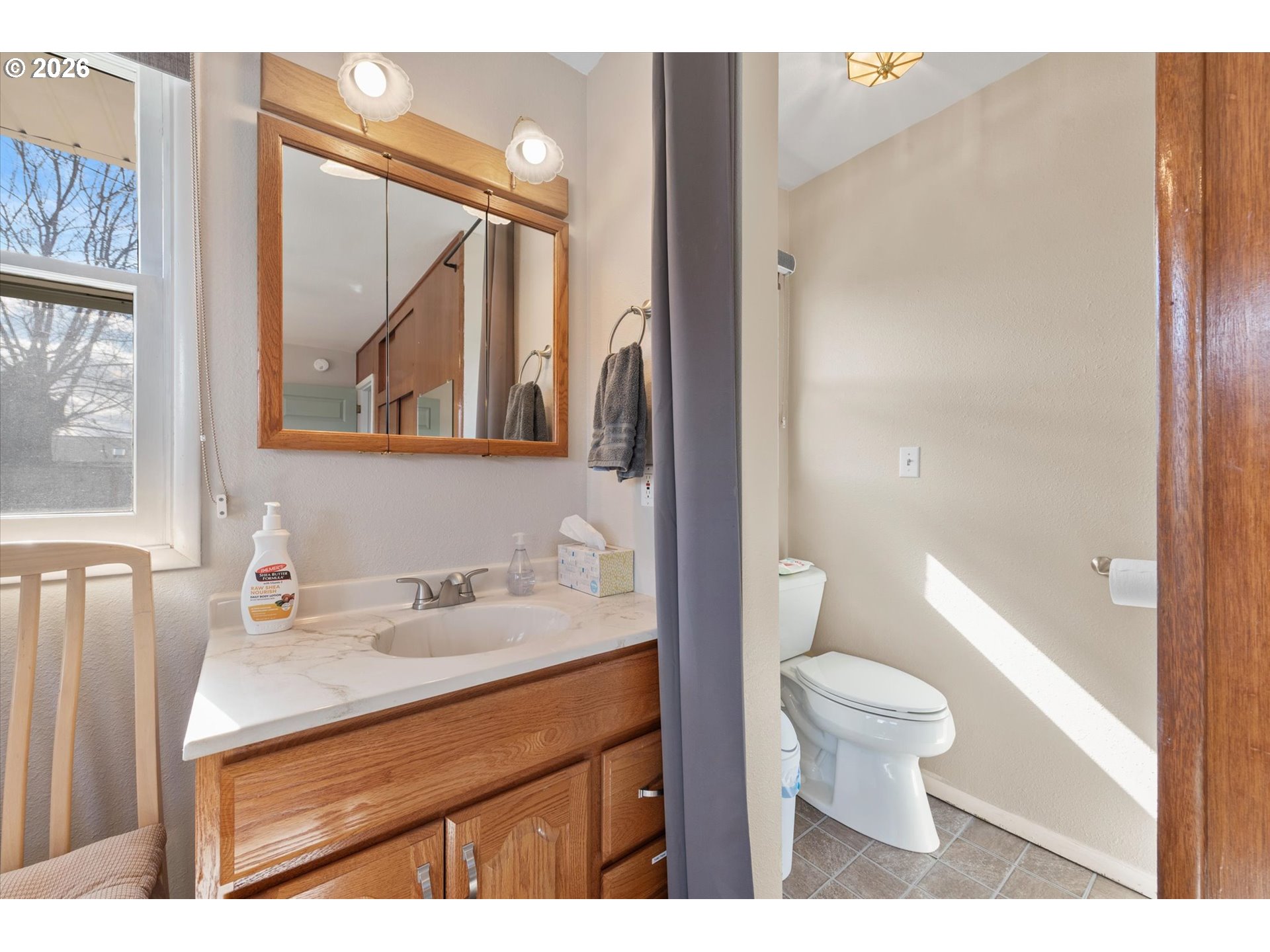 2975 North 3rd Street Baker City, OR 97814 - Photo 31 of 48 a bathroom with a sink a toilet and shower