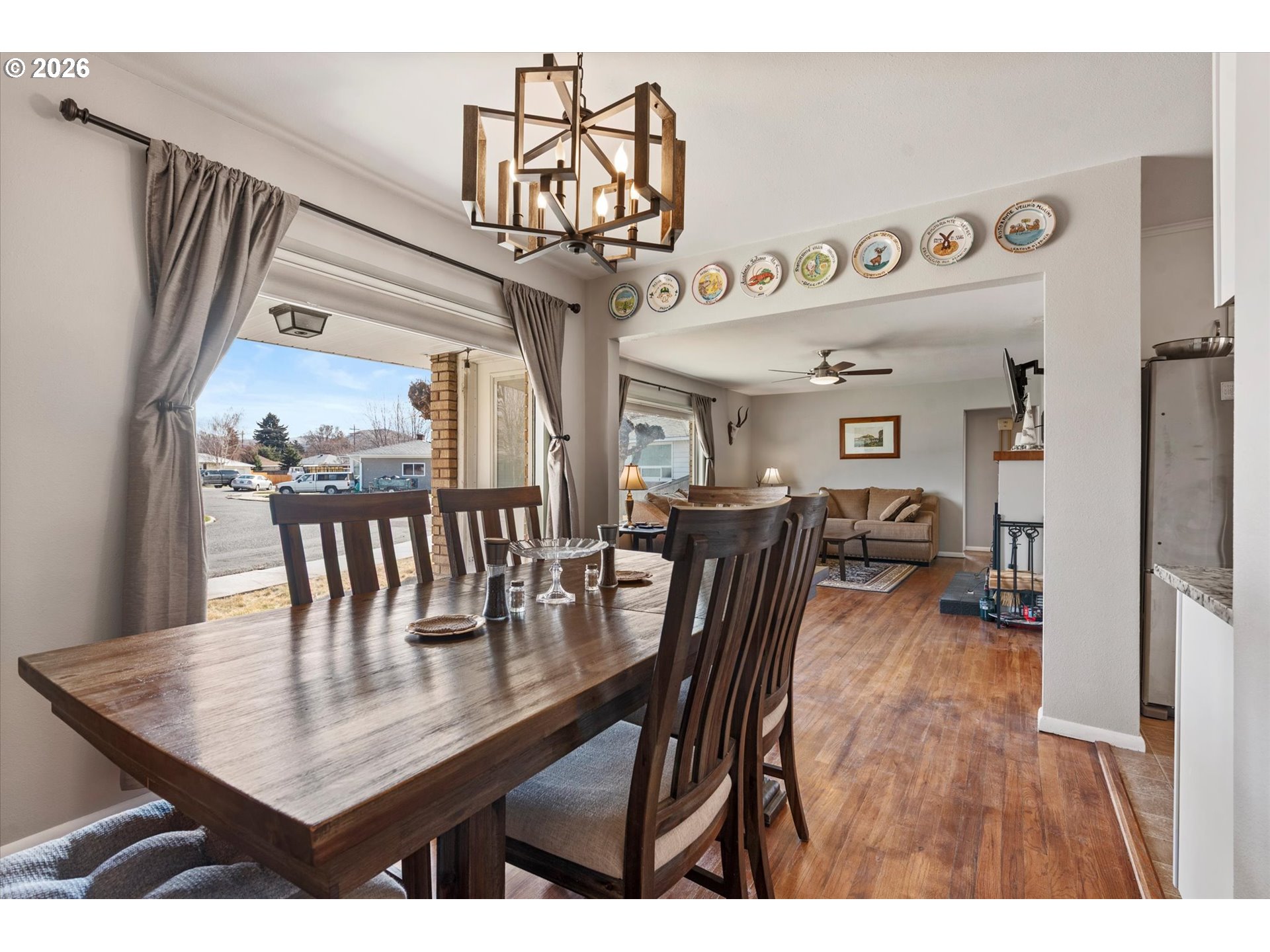 2975 North 3rd Street Baker City, OR 97814 - Photo 10 of 48 a view of a dining room with furniture and a chandelier