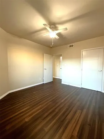 a view of a hallway with washer and dryer