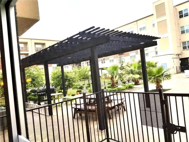 a view of a building with a tree