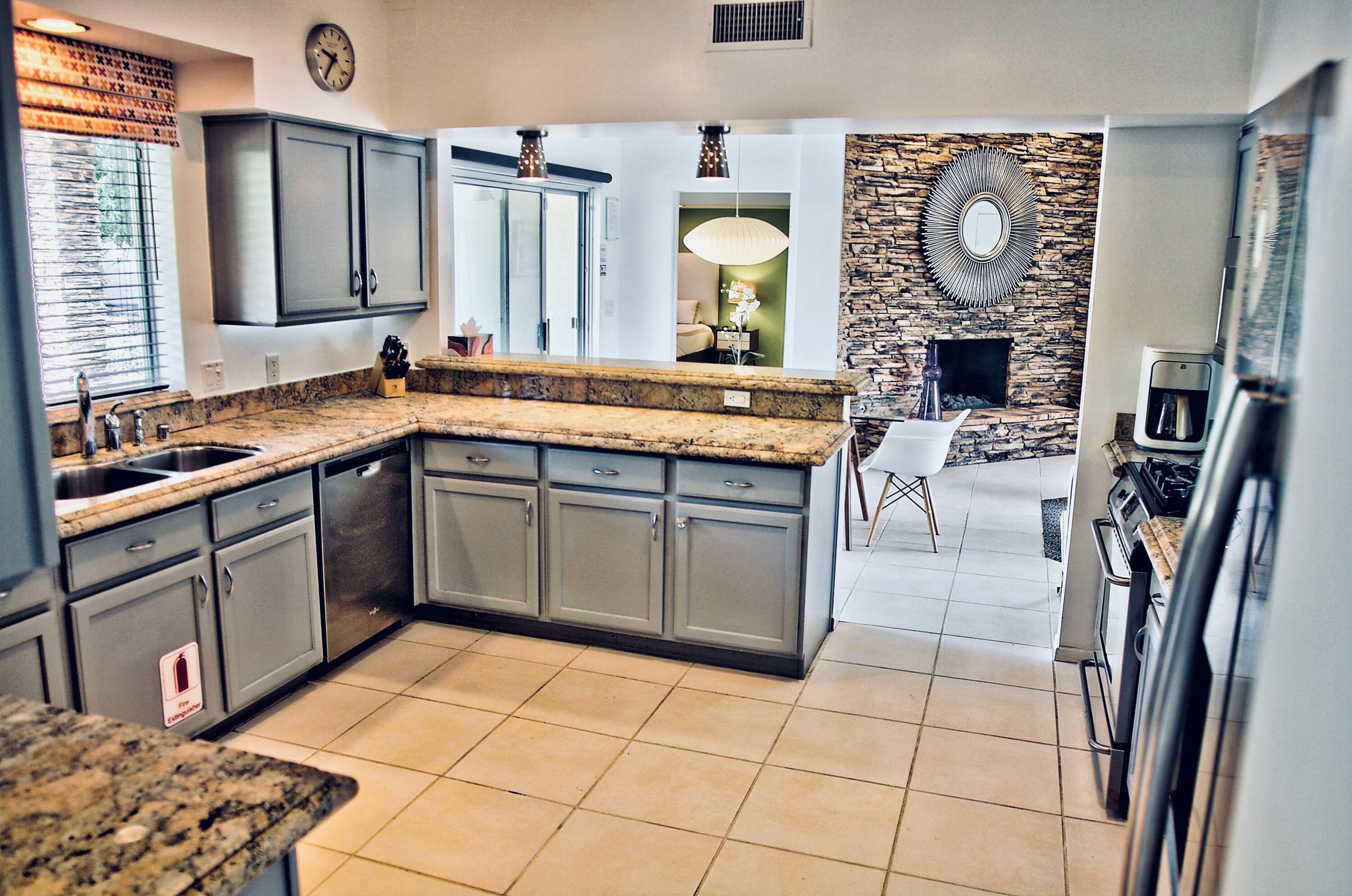 1443 North Vaquero Road Palm Springs, CA 92262 - Photo 37 of 70 Kitchen to Living Room