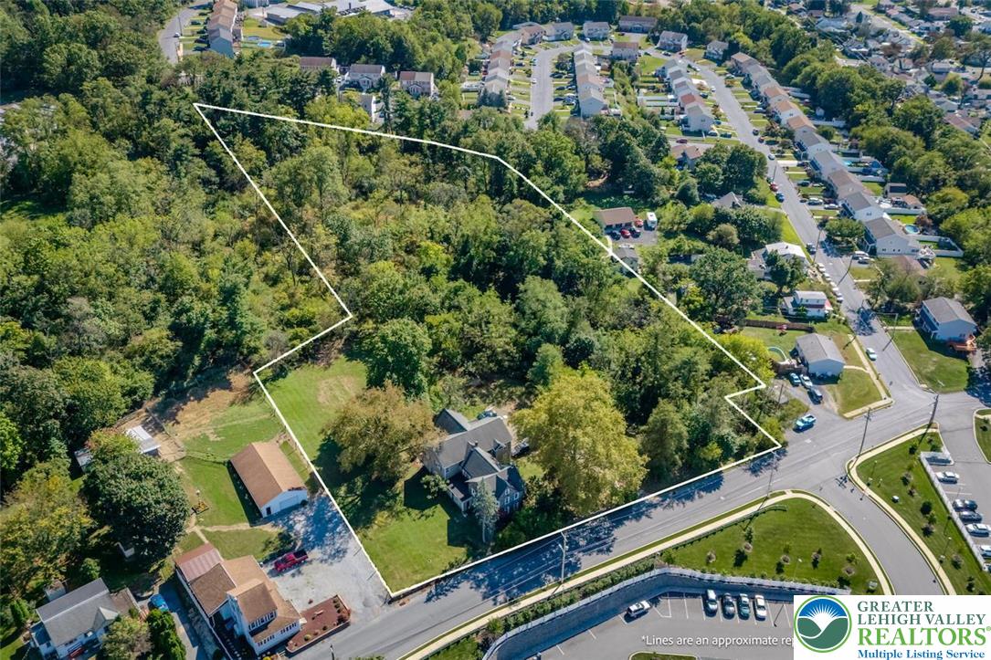 1220 Hay Road Temple, PA 19560 - Photo 21 of 27 an aerial view of swimming pool a yard and outdoor seating