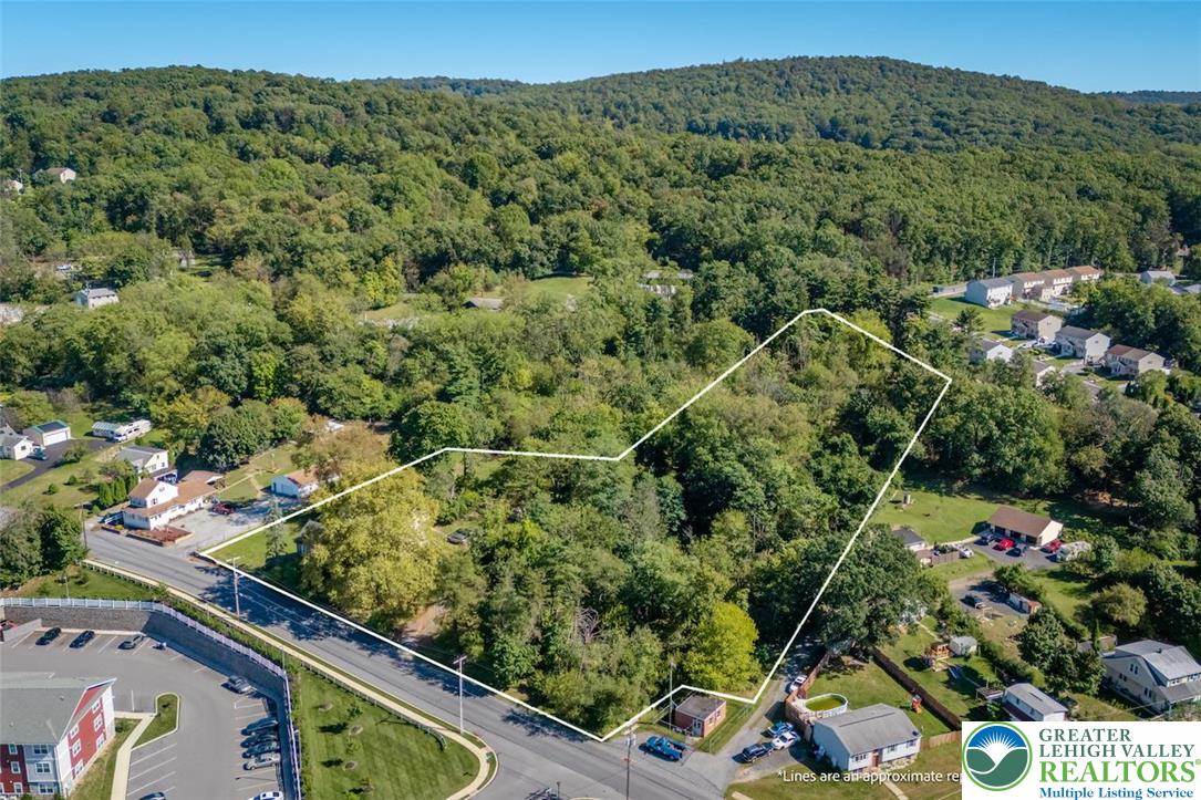 1220 Hay Road Temple, PA 19560 - Photo 22 of 27 an aerial view of a forest with houses