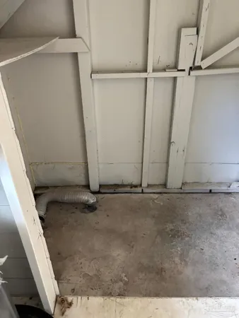 a view of a room with racks on the wall
