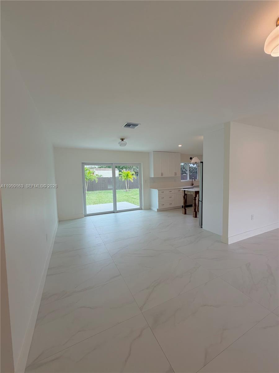19221 Southwest 92nd Road Cutler Bay, FL 33157 - Photo 30 of 30 a view of empty room with a window