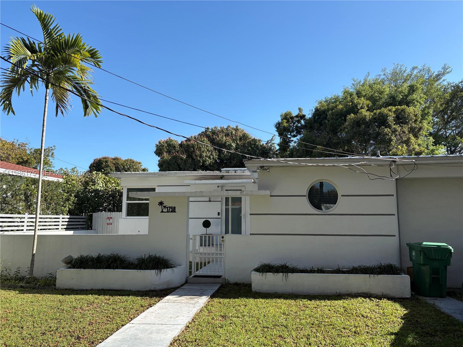 1758 Southwest 18th Street Miami, FL 33145 - Photo 12 of 15 a view of a house with a backyard