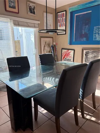 a view of a workspace with furniture