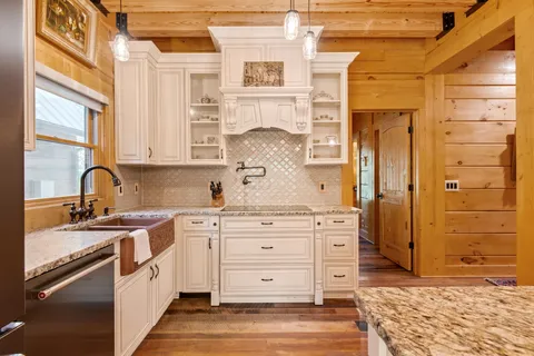 a lobby with furniture and wooden floor