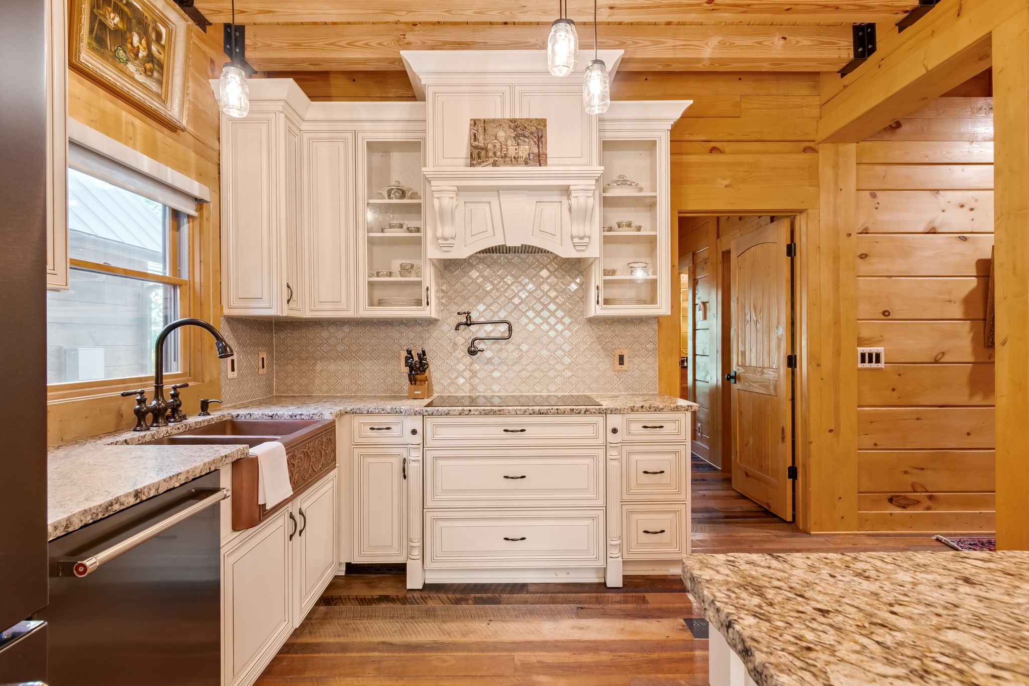 6011 Garrison Springs Road Franklin, TN 37064 - Photo 16 of 99 a kitchen with stainless steel appliances granite countertop a sink and cabinets