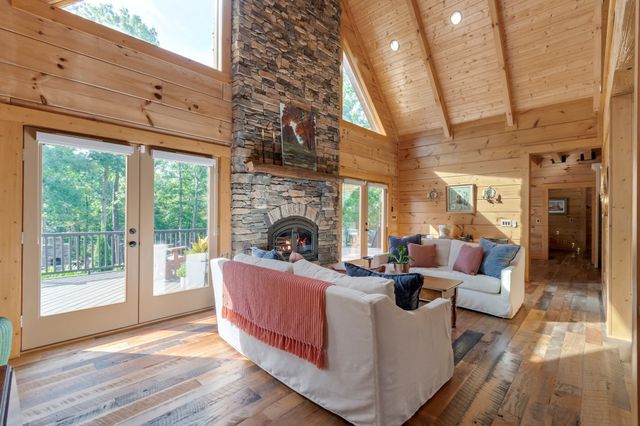 a view of a balcony with wooden floor