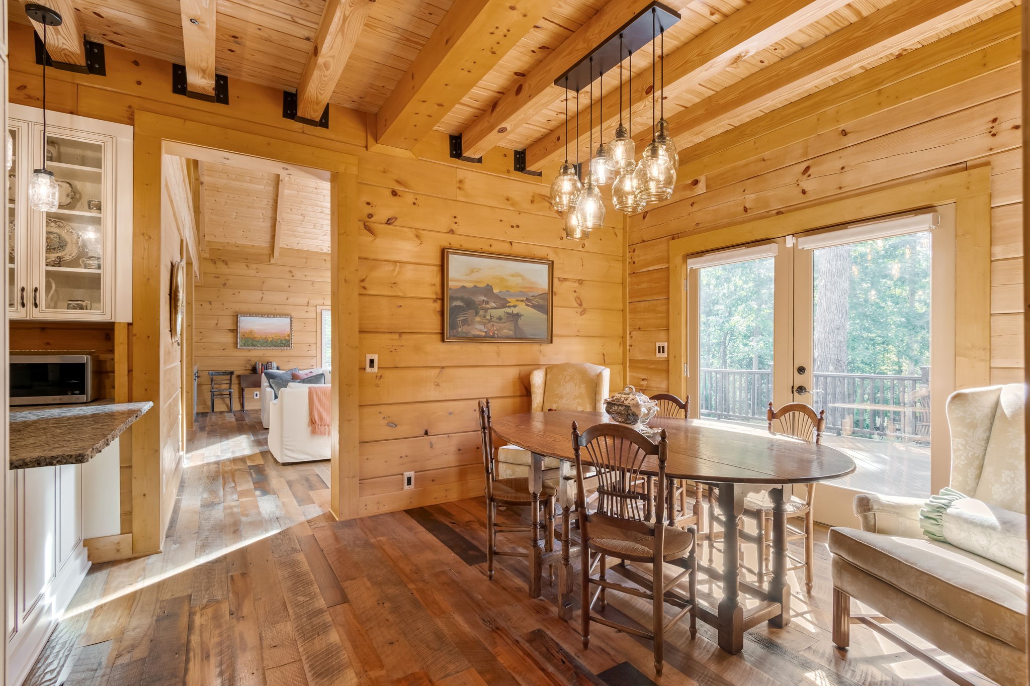 6011 Garrison Springs Road Franklin, TN 37064 - Photo 34 of 99 a dining room with furniture a chandelier and wooden floor