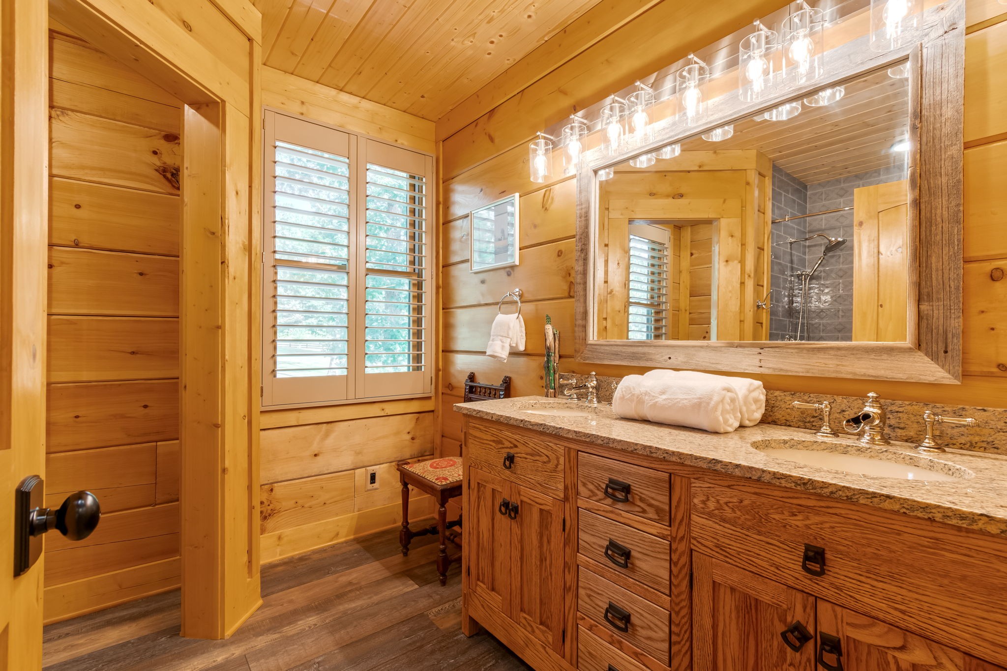 6011 Garrison Springs Road Franklin, TN 37064 - Photo 57 of 99 a bathroom with a granite countertop sink mirror and a bathtub