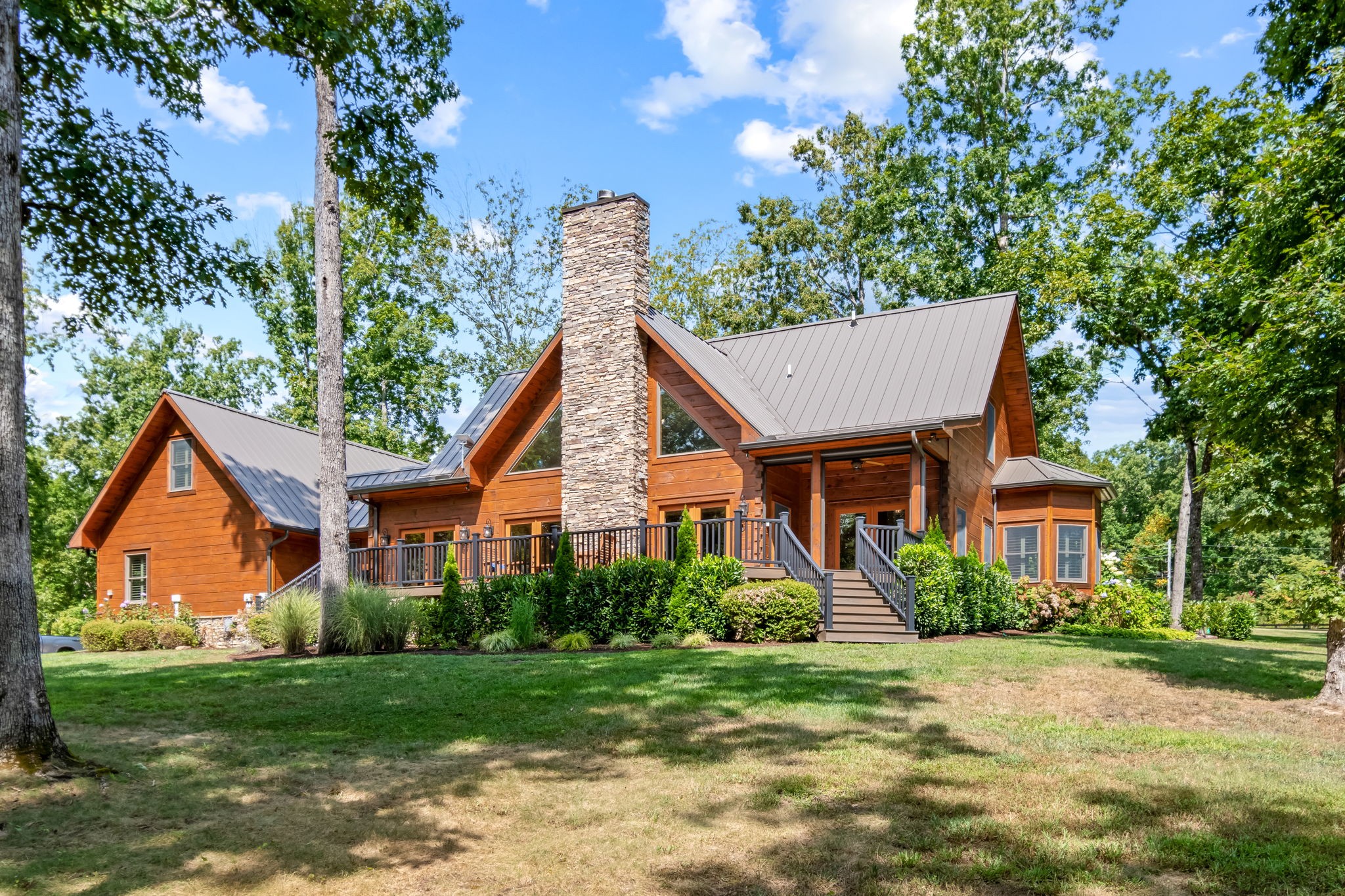 6011 Garrison Springs Road Franklin, TN 37064 - Photo 9 of 99 a view of a house with a yard and potted plants